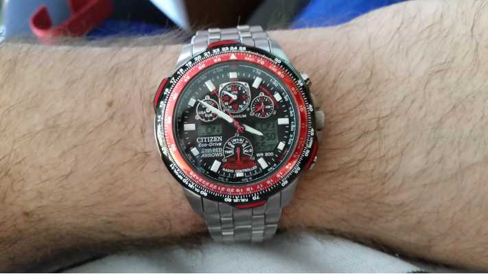 Casio red store arrows watch